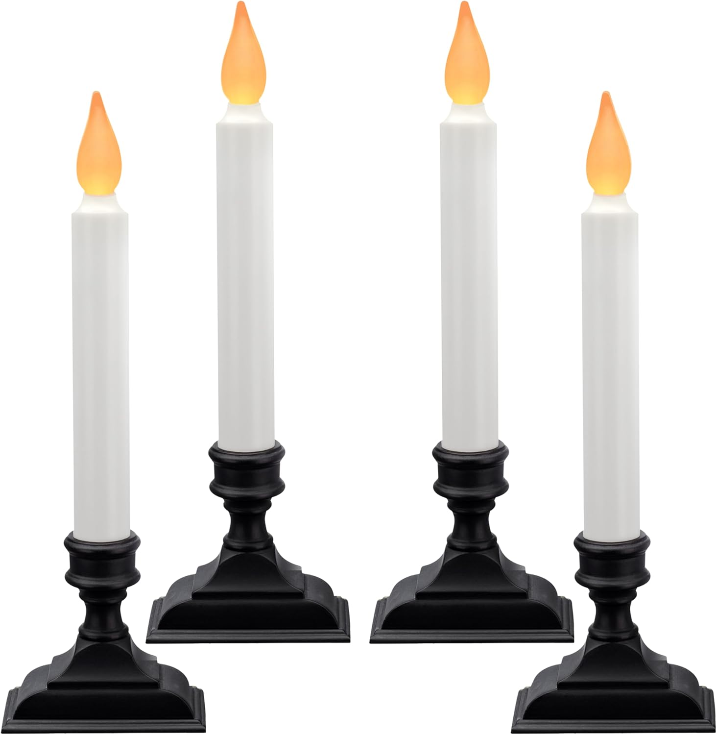 Xodus Innovations cordless window candles glowing on a windowsill